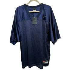 Nike Team 2XL Blank Football Jersey Blue Penn State PSU NWT Retro 535528-419 Size: XXL 29.5" Armpit to armpit 12" Sleeves 31" Long New with tags Casual Navy Sports Shirt, Navy Casual Sports Shirt, Casual Navy Shirt For Sports, Blue V-neck Shirt With Relaxed Fit, Blue Relaxed Fit V-neck Shirt, Nike Navy Sports Tops, Nike Sporty Navy Top, Sporty Navy Nike Top, Nike Casual V-neck Top