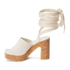 Vegan, platform heeled sandal with lace up detail. | Beach Women's Skylar Platform Sandal, Ivory, 9M Chic Chunky Platform Lace-up Heels, Chic Synthetic Lace-up Sandals For Vacation, Beach High Heel Lace-up Synthetic Sandals, Chic Summer Platform Lace-up Sandals, Adjustable Lace-up Platform Wedge Sandals, Summer Synthetic Lace-up Sandals, Synthetic Lace-up Sandals For Summer, Vacation Platform Lace-up Open Toe Sandals, Summer Lace-up Platform Sandals