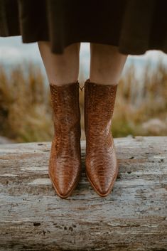 The Caty Western-inspired ankle boot is a legacy style that has transcended over the seasons. With quality craftsmanship and lux materials, these boots only get better with each wear. Details: Leather upper. Manmade outsole. 7 in / 17.78 cm shaft height. 10 in / 25.4 cm topline circumference. 2.5 in/6.35 cm heel. Textile lining. Padded insole. Zipper closure. Leather stacked heel. Fits true to size. The Seasons, Get Better, Stacked Heel, Riding Boots, Cognac, Cowboy Boots, Ankle Boot, Leather Upper, Product Launch