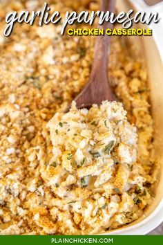 a casserole dish filled with garlic parmesan chicken casserole and topped with a wooden spoon