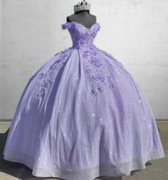 Introducing our Off the Shoulder Lavender Sequin 3D Floral Quinceanera Dress. The stunning quinceanera dress is crafted from delicate lace fabric. The off-the-shoulder neckline and sleeveless design create an elegant silhouette, adorned with appliqued 3D flowers. With a dramatic chapel train and flattering corset back. This dress promises to make you feel like royalty on your special day. Details: Silhouette: Ball Gown Style Fabric: Lace Fabric Color: Lavender, Black, Pink, Blue, Red, Champagne Lavender Quince Dress, Dark Purple Quinceanera Dresses, Butterfly Quince Dress, Floral Quinceanera Dress, Light Purple Quinceanera Dresses, Lilac Quinceanera Dresses, Light Blue Quinceanera Dresses, Quince Dresses Purple, Purple Quinceanera Dresses