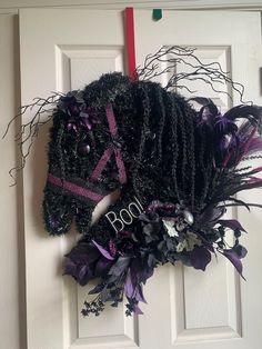 a door decorated with black and purple decorations