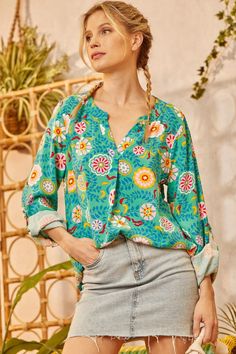 Step into spring with the Hello Lady Blouse from Andree by Unit. This relaxed fit blouse features a split neckline and vintage-inspired teal and floral print. Crafted with lightweight rayon, it’s easy to wear with a pair of jeans or shorts on warmer days. The long sleeves and relaxed sleeve and cuff add to its chic, retro style. The Hello Lady Blouse is perfect for adding a timeless, feminine touch to your wardrobe. 100% Rayon Want to view this on the *Live* Sizing & Styling Guide?! Watch it in Hello Lady, Rachel Clark, Styling Guide, Hello Ladies, Fitted Blouses, Retro Style, Style Guides, Retro Fashion, Blouses For Women