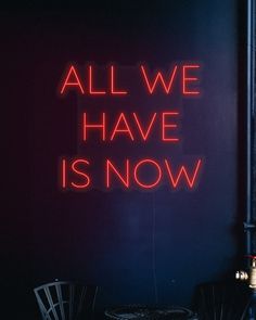 a neon sign that says all we have is now