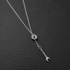 Perfect for turbo lovers, car enthusiasts & gear heads! Each comes with a nut and your choice of pendant and silver necklace. Dimensions & Materials:- Necklace: 18in, Sterling Silver- Hex Nut: Stainless Steel Lexus Logo, Bike Jewelry, Hex Nut, Gear Head, Lariat Necklace, Girls Jewelry, Dirt Bike, Art Clothes, Ring Bracelet