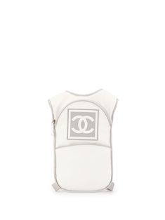 The Chanel maison has been a mark in the haute couture and ready-to-wear industry for over a hundred years, perpetuating sophistication and practicality in the feminine wardrobe. Case in point: this white and grey canvas Sport Line CC backpack. Featuring adjustable shoulder straps, a signature interlocking CC logo, a top zip fastening, a main internal compartment and a lining. Please note that pre-owned items are not new and therefore might have minor imperfections. Feminine Wardrobe, Quilted Handbags, Shopping Chanel, Logo A, Cc Logo, Coco Chanel, Karl Lagerfeld, Chanel Bag, Timeless Fashion