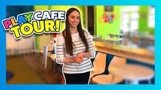 a young woman standing in front of a table with a sign that says play cafe tour