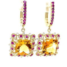 9.72 Carat Citrine Yellow Sapphire Diamond Yellow Gold Drop Earrings  These lovely earrings have 2 vibrant Cushion Cut Citrine Quartz that weigh 8.00 carats. They are surrounded by 32 Round Cut Diamonds that weigh 0.41 carats (Clarity: SI1, Color: F) and 40 Pink Sapphires that weigh 0.78 carats. The total carat weight of the earrings are 9.19 carats. The earrings are about 1.25 inches in total length and have a lever back backing. Approximate Gold gram: 7.2 grams  Exact dimensions for this item Yellow Gold Drop Earrings, Lovely Earrings, Yellow Sapphire, Jewellery Design, Gold Drop Earrings, Sapphire Diamond, Round Cut Diamond, Cushion Cut, Pink Sapphire