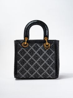 The Callista Grid Pattern Rhinestone Snakeskin Convertible Bag is a must-have for any fashion forward individual. With its unique grid pattern and luxurious snakeskin material, this bag will elevate any outfit. Complete with stunning rhinestone accents, it can be worn as a shoulder bag or converted into a stylish crossbody. Perfect for day or night, this bag is versatile and statement-making. SizeHEIGHT: 9.5"WIDTH: 7.5"DEPTH: 4" QualityMade with premium materials for quality and endurance Import Luxury Shoulder Bag With Rhinestones And Top Handle, Luxury Rhinestone Shoulder Bag With Top Handle, Luxury Rhinestone Shoulder Bag For Everyday Use, Luxury Rhinestone Bags For Shopping, Glamorous Crossbody Bag For Everyday Use, Luxury Black Rhinestone Shoulder Bag, Glamorous Shoulder Bag With Detachable Strap For Everyday, Designer Bags With Rhinestones For Everyday Use, Glamorous Top Handle Shoulder Bag For Everyday Use