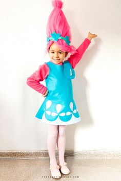 This Poppy Troll Costume Tutorial will make your little troll the hit of the party. Quick and easy, No Pattern needed and will fit any size! Poppy Halloween Costume Diy, Diy Princess Poppy Costume, Trolls Toddler Costume, Diy Poppy Costume, Poppy Hair Trolls Diy, Poppy And Viva Costumes, Queen Poppy Costume, Viva Costume Trolls, Diy Poppy Troll Costume