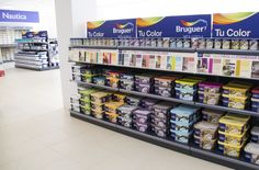 an aisle in a grocery store filled with products