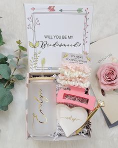 an open box containing personal items and flowers