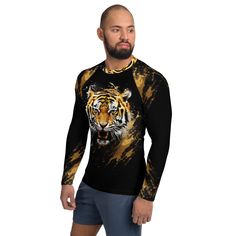 Don't let sunburn, wind, sand, or other elements ruin your day! This Men's Smooth & Versatile Rash Guard Activewear Shirt with a Unique Tiger Design will protect you while you have fun doing sports. It is slim-fitted with flat ergonomic seams, and a bit longer than your casual tee for extra comfort and protection. * 82% polyester, 18% spandex * Very soft four-way stretch fabric that stretches and recovers on the cross and lengthwise grains * UPF 50+ * Comfortable longer body and sleeves * Flat seam and coverstitch Refer to Sizing Chart above in Photo Section Moisture-wicking Crew Neck Top For Water Sports, Long Sleeve Sports Shirt For Summer, Long Sleeve Shirt For Summer Sports, Weightlifting Shirts, Flat Seam, Unique Beach, Tiger Design, Beach Casual, Casual Tee