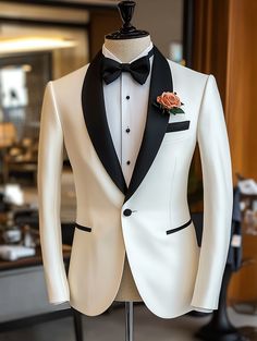 Make a statement in this sharp white tuxedo. Find your perfect fit on our website.   #SuitCentury #TuxedoStyle #WhiteTux #menssuitstyle #mensfashion #menssuits #mensstyle #suitstyle #suits #menstyle #suitup #menswear #suitandtie #men #dapperfashion #style #suitsformen #mensfashionblog #suited White Black Tuxedo, White And Black Wedding Suit, White Tuxedo For Groom, White And Black Tuxedo Wedding, Black And White Tuxedo Wedding, White Suits Wedding, Groom Attire White, White Tuxedo For Men, White Tux Groom