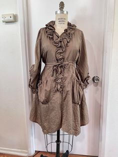 Vintage Ruffled Dress For Fall, Vintage Spring Dresses With Pockets, Vintage Dresses With Pockets For Spring, Spring Vintage Dresses With Pockets, Fitted Bohemian Dresses With Pockets, Bohemian Fitted Dresses With Pockets, Spring Lagenlook Dress With Pockets, Vintage Beige Dress With Pockets, Feminine Vintage-style Ruffled Dresses