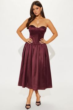 Available In Wine. Satin Midi Dress Sweetheart neckline Strapless Corset waist Back zipper Tulle lining Slight stretch Length = 47" Self: 96% Polyester 4% Spandex Lining: 100% Polyester Imported California Proposition 65 WARNING: Cancer and Reproductive Harm - www.P65Warnings.ca.gov. | Princess Treatment Corset Satin Midi Dress in Wine size Small by Fashion Nova Wine Colored Dresses, Dress Sweetheart Neckline, Corset Waist, Strapless Corset, Satin Midi Dress, Corset Dress, Princess Dress, Sweetheart Neckline, Fashion Nova