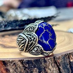 Natural Lapis Lazuli Ring, Men Silver Lapis Ring , Large Turkish Handmade Lapis Ring , Blue Lapis Lazuli  Ring, 925k Sterling Silver Ring ★Item Details * Gender : Male / Female * Material : 925K Sterling Silver * Total weight : 28 Grams * Gemstone :  Lapis Lazuli Stone ✔ Ready to Ship in 1-2 Business Days .. ✔ Shipped to the Worldwide 1-5 business days with free shipping... ✔ The product will be sent to you with a handmade wooden box to avoid any damage during shipping... ✔ Visit our store, brow Spiritual Blue Engraved Ring, Ring Men Silver, Handmade Wooden Boxes, Lapis Lazuli Jewelry, Lapis Ring, Lapis Lazuli Ring, Blue Lapis Lazuli, Ring Men, Lapis Lazuli Stone