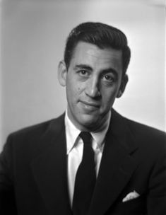 black and white photograph of a man in a suit