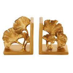 This tree set of 2 non-skid bookends is perfect for any bookshelf or office space. This item ships in 1 carton. Polystone bookends make a great gift for any occasion. Suitable for indoor use only. This item ships fully assembled in one piece. This gold colored polystone non skid bookends comes as a set of 2. Glam style. House of Hampton® | House of Hampton® Cole & Grey Polystone Ginkgo Tree Decorative Bookends brown / green / orange / yellow in Gold | 7.5" H X 6.65" W X 4" D | Wayfair Gold Bookends, Orange Resin, Decorative Bookends, Ginkgo Tree, Hampton House, Gold Book, Glam Style, Glam Fashion, Game Room Furniture