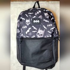 Nwot Dc Comics Batman Backpack- Has One Front Pocket With Zipper. Left Outer Pocket With Zipper. Right Outer Pocket. Very Spacious. Has Never Been Used. Originally Purchased For My Son Who Wrote His Initials Inside And Found Out Skulls Were Not Allowed In Our School District. Backpack Is New. 22 In H X 15 1/2 In W Black Backpack For Cosplay, Casual Standard Backpack For Cosplay, Casual Cosplay Standard Backpack, Black Standard Backpack With Character Print, Everyday Use Back To School Bags With Character Print, Black Backpack With Character Print, Casual Black Bags With Character Print, Casual Black Bag With Character Print, Character Print Backpack For Everyday Use