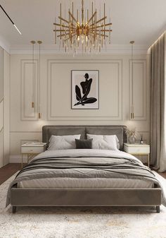 a bedroom with a large bed and chandelier hanging from the ceiling above it