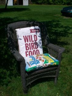 a chair sitting in the grass with a pillow on it's back that says, outdoor pillows from pet food bags