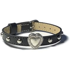 "Love hearts?   You'll love this bracelet!  It has a Chrome color  Slide Charm Heart with round studs evenly spaced across the center of a genuine black leather buckle bracelet wristband strap. This black leather buckle wristband bracelet strap is 10mm wide and about 8 inches long.   It can fit a wrist from 5.5\"  to 7.5\" around.  The strap is made of Genuine leather material and are stamped as such on the back. They are sewn around the edges for more durability. The band is adjustable and has Cute Charm Bracelet, Adjustable Metal Heart Bracelet For Valentine's Day, Adjustable Metal Bracelets For Valentine's Day, Adjustable Metal Bracelet For Valentine's Day, Adjustable Metal Heart Bracelet For Friendship, Adjustable Heart-shaped Metal Bracelets, Adjustable Metal Bracelets With Studs, Adjustable Nickel-free Heart Bracelet For Everyday, Black Bracelet Women