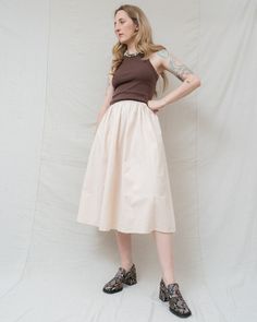 [she loved the sound of summer rain tapping against her window]Meet Emma, the embodiment of effortless style! This handmade full skirt radiates cozy minimalist chic vibes. Its stretchy elastic waist ensures unrestricted comfort, making it perfect for any day of the month. Crafted from stunning, thick linen fabric, Emma offers a luxurious feel you'll simply adore. Dress it up with boots and a blouse for a date, or keep it casual with sneakers and a tee for running errands. Heading to the office? Summer Flared Skirt With Gathered Waist, Summer Skirt With Gathered Waist, Summer Flowy Skirt With Gathered Waist, Spring Long Skirt With Gathered Waist, Flowy Summer Skirt With Gathered Waist, Flowy Skirt With Gathered Waist For Summer, Spring Tiered Skirt With Gathered Waist, Summer Full Skirt For Daywear, Chic Flared Skirt With Gathered Waist