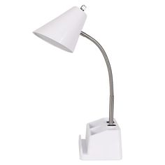 a white desk lamp sitting on top of a table