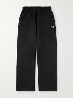 Balenciaga's sweatpants are printed with a logo that's inspired by retro racing styles. They're cut for a baggy, wide-leg fit from soft cotton-jersey and have a comfortable elasticated waistband. Balenciaga Sweatpants, Black Baggy Sweatpants, Singer Dr, Balenciaga Clothing, Sweatpants For Men, Dr Closet, Balenciaga Men, Lee Juyeon, Baggy Sweatpants