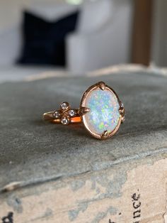 Australian Opoal solitaire set in 18k rose gold Handmade 14k Gold Opal Wedding Ring, Handmade Oval Opal Ring In Fine Jewelry Style, Handmade Oval Opal Ring Fine Jewelry, Elegant Opal Ring With Rose Cut Diamonds, Handmade Elegant Ethiopian Opal Ring, Opal Ring With Rose Cut Diamonds, Unique Opal Rings With Gemstone Accents, Unique 14k Gold Opal Wedding Ring, Oval Opal Rings With Rose Cut Diamonds