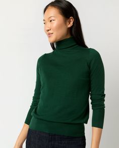 A cashmere turtleneck is one of the most versatile sweaters you can have in your closet. This one’s made up in fine-gauge Mongolian cashmere with a trim fit through the body and delicate ribbing at the neckline, hem, and turnback cuffs. Dark Green Turtleneck, Ann Mashburn, Green Turtleneck, Green Turtle, Trim Fit, Clothing Catalog, Cashmere Turtleneck, Buckle Shoes, Sweater Gift