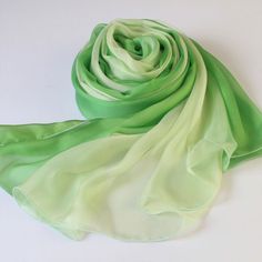 SPECIAL PROMOTION: Please use coupon code "SILKSCARF" to enjoy 10% discount on all scarf orders over $100 (Excl Shipping). Made from premium mulberry silk chiffon, this scarf is perfect for an autumn day that is not so chilly. This silk scarf has a green coloured theme, with a gradient shades from mint green to light green. Available in 2 sizes: 78 by 25 inch (200 by 65 cm) 78 by 50 inch (200 by 130 cm) Fabric: 100% Mulberry Silk Chiffon Dispatch in 2 days. Regular Shipping via China Post Air Pa Elegant Green Summer Scarves, Elegant Green Scarves For Summer, Green Silk Scarves For Formal Occasions, Formal Green Silk Scarves, Green Silk Scarves For Summer, Silk Chiffon Scarves, Green Gradient, Chiffon Scarf, Green Silk