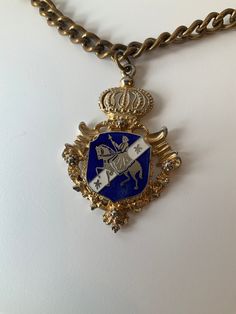 Stunning pendant. Coat of arms Coro. Signed. Dual insignia. The lower insignia, from a bit of research, would date this piece around 1944-1947 (differing sources). It is certainly pre 1955 when the circular copyright symbol was adopted. A high quality Coat of Arms pendant on a quality, hefty chain. The entire piece weighs 91 grams. In very good condition as shown in the photos. Royal Emblem, Copyright Symbol, Coat Of Arms, Antique Collection, Jewelry Necklace Pendant, Necklace Lengths, Vintage Jewelry, Jewelry Necklaces, Pendant Necklace