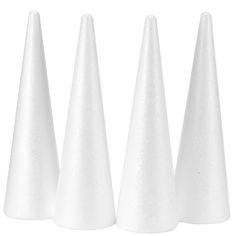 three white plastic cones are lined up against each other