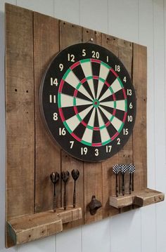 a dart board mounted to the side of a wooden wall with other darts on it