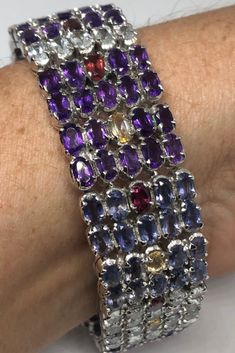 Handmade Genuine Mixed Gemstone in 925 Sterling Silver Tennis Bracelet https://www.etsy.com/listing/718614178/handmade-genuine-mixed-gemstone-in-925 Luxury Multicolor Amethyst Gemstones, Formal Multicolor Natural Gemstones, Formal Multicolor Amethyst Jewelry, Luxury Multicolor Amethyst Jewelry, Handmade Multicolor Gemstones For Formal Occasions, Purple Multi-stone Gemstones In Sterling Silver, Luxury Multicolor Gemstones In Sterling Silver, Multicolor Multi-stone Amethyst Jewelry, Formal Handmade Multicolor Gemstones