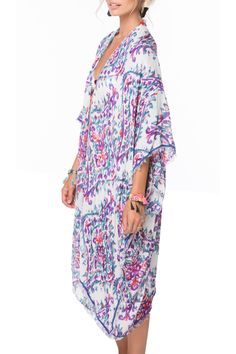 Bright, watercolor prints bring vivid contrast to this airy Kimono style from Pool to Party. Great paired with shorts or jeans or can be poolside ready. Vacay here we come. Modal/Viscose Luxury Blend One Size, Loose and Easy Shape Made in USA from fabric from India Luxury Kimono, Bright Watercolor, Luxury Printing, Kimono Wrap, Easy Shape, Watercolor Prints, Luxury Pool, Stylish Outfit, Kimono Style