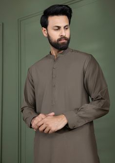 2 Piece - Kurta Shalwar : Skillfully crafted from premium cotton, this classic kurta shalwar for men is a wardrobe staple this season! Details : Plain Front, Plain Back, Band Neck Color: Rust Fabric : Wash & Wear Yarn Dyed Pin Stripes Classic Cotton Kurta For Semi-formal Occasions, Formal Cotton Traditional Wear Straight Kurta, Classic Dabka Sherwani For Eid, Cotton Traditional Wear For Semi-formal Occasions, Semi-formal Cotton Traditional Wear With Long Sleeves, Unstitched Cotton Churidar, Cotton Traditional Long Sleeve Semi-formal Wear, Semi-formal Long Sleeve Cotton Traditional Wear, Cotton Nehru Jacket With Dabka Work For Eid