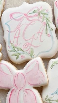 decorated cookies with bows and ribbons on them