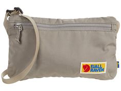 Fjallraven Vardag Pocket - Bags : Fog : When you need a small handbag that just works, start with the Fjällräven Vardag Pocket., featuring a zippered pocked to store things such as a smartphone, keys, maps, extra cash, etc, as well as a zippered security pocket on the opposite side. Key attachment on inner compartment. Adjustable shoulder strap Constructed of polyester. Zipper closure. Imported. Measurements: Bottom Width: 9 in Depth: 1 2 in Height: 6 in Strap Length: 50 in Strap Drop: 23 in Wei Multifunctional Hiking Bag With Cell Phone Pocket, Functional Shoulder Bag With Zipper For Hiking, Functional Travel Accessories With Zipper Pouch For Outdoor, Nylon Bag With Zipper For Camping, Nylon Bag With Zipper Closure For Camping, Nylon Bags With Zipper Closure For Camping, Nylon Camping Bag With Zipper Closure, Multifunctional Camping Bag With Pockets, Functional Camping Bags With Pockets