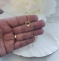 Gold Dainty Necklace, Tiny Heart With CZ Stone, 14k Heavy Plated Gold Necklace, Minimalist Necklace, Tiny Heart Necklace, High Quality #DaintyJewelry #14kGoldNecklace #14kGoldPendant #DaintyNecklace #14kGoldJewelry #GoldHeartPendant #HeartPendant #CzJewelry #MinimalistNecklace #DaintyChains Dainty Heart Necklace With Clavicle Chain For Anniversary, Dainty Gold Plated Heart Necklace Gift, Dainty Gold-plated Open Heart Necklace, Dainty Gold Plated Open Heart Necklace, Gold Plated Open Heart Necklace With Delicate Chain, Delicate Open Heart Necklace With Delicate Chain, Delicate Open Heart Chain Necklace, Dainty Gold Plated Open Heart Charm Necklaces, Dainty Heart Cut Charm Necklace With Adjustable Chain