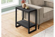 a black end table with a blue sign that says flexshoper as low as $ 10 per week