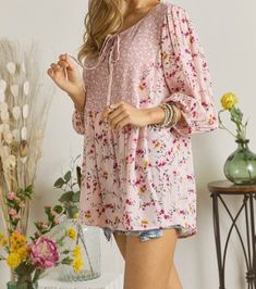 Introducing our new Floral Peasant Tunic Top! This stunning top features a printed design, round neck, 3/4 sleeves, and a loose fit for ultimate comfort and style. Don't miss out on this must-have addition to your wardrobe! Returns We have a 7-day return policy, which means you have 7 days after receiving your item to request a return. To be eligible for a return, your item must be in the same condition that you received it, unworn or unused, with tags, and in its original packaging. Free of mak Printed 3/4 Sleeve Blouse For Fall, Printed 3/4 Sleeve Blouse, Vacation Floral Print Half Sleeve Tops, Floral Print Half Sleeve Tops For Vacation, Fall Floral Print Half Sleeve Blouse, Vacation Half Sleeve Blouse With Floral Print, Half Sleeve Floral Print Tops For Vacation, Casual Printed Blouse With 3/4 Sleeves, Flowy Half Sleeve Blouse For Spring