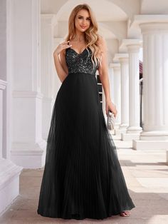 This sophisticated evening dress features a V-neck sleeveless top and a shimmering sequined bodice. The high-waisted tulle skirt enhances its ethereal look, while the open back adds a touch of design. Fit: Please refer to size chart. Length: Floor Length. Sleeve Style: Sleeveless. Closure: It is concealed a zipper up the back. Undergarments: It is not padded, with lining. Fabric:The garment comprises tulle. Stretch: Fabric is no stretch. Sleeveless Tulle Sequin Dress For Party Season, Sleeveless Sequin Tulle Dress For Party Season, Glamorous Tulle Sequin Dress With Contrast Sequin, Sleeveless Tulle Sequin Party Dress, Party Sequin Dress With Contrast Sequin On Tulle, Party Sequin Tulle Dress With Contrast Sequin, Party Sequin Dress With Contrast Sequins And Tulle, Sleeveless Evening Dress With Contrast Sequin For Summer, Sleeveless Contrast Sequin Evening Dress For Summer