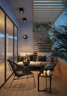 an outdoor living area with furniture and candles