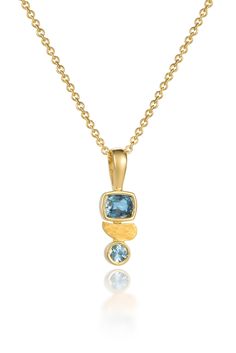 Gold & Stone Necklace - A fresh take on gorgeous colored gemstones set in small, hard-to-miss clusters, this necklace boasts shades of teal sapphires 0.75ct totalaligned with a wing of 22k hammered gold.  This pieces nests perfectly on its own or plays nicely with your existing treasures. One of a kind, lobster clasp closure. Gold Stone Necklace, Colored Gemstones, A Wing, Shades Of Teal, Sapphire Pendant, Hammered Gold, Gold Stone, Stone Necklace, Gemstone Colors