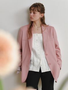 This product is the Carol Jacket, a piece that stands out with its clean lines and structured form. The jacket is designed with a notched lapel and a two-button closure, which add to its polished look. It's a versatile garment that can elevate a casual outfit or complete a formal ensemble with its tailored elegance. - The notched lapel provides a classic and sharp detail that enhances the jacket's sophisticated profile.- A two-button closure offers simplicity and functionality, making it easy to dress up or down.- Its tailored construction ensures a flattering fit that's both comfortable and stylish.- The jacket's sleek design pairs well with various wardrobe staples, from casual denim to formal trousers, making it a versatile addition to any closet. Spring Blazer With Hidden Button And Suit Collar, Spring Blazer With Hidden Button Closure And Lapel Collar, Spring Tailored Blazer With Suit Collar, Spring Sport Coat With Lapel Collar For Tailoring, Tailored Blazer With Suit Collar For Spring, Spring Sport Coat With Lapel Collar And Pressed Crease, Spring Office Sport Coat With Lapel Collar, Spring Blazer With Hidden Button Closure, Chic Spring Sport Coat With Suit Collar