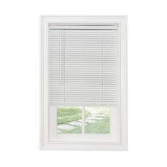 a white window with the blinds closed