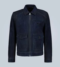 Expertly crafted in Italy, this navy Prada suede leather jacket features stitching detail, large front patch pockets and is finished with the iconic triangle logo..Made in Italy.Material: lamb leather.Care instructions: specialist clean.Pockets: buttoned pockets, breast pocket, zipped pocket, internal pockets.Designer color name: Navy.Closure: zipper fastening.Lining: fully lined, 100% viscose.True to size.Designed for a loose fit.Mid-weight material.Falls to the hip.The model in the picture is Business Suede Outerwear With Pockets, Suede Leather Jacket With Pockets For Work, Designer Navy Outerwear With Pockets, Designer Business Leather Jacket With Pockets, Suede Leather Jacket, Prada Men, Triangle Logo, Floral Print Shorts, Leather Jacket Men